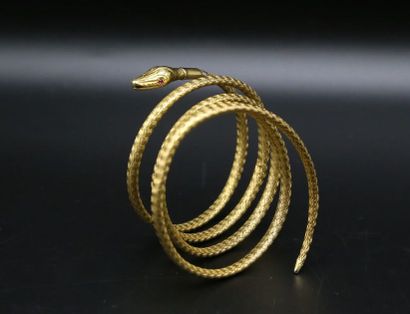 null Bracelet serpent en fils d'or jaune 750 millièmes tressés, les yeux ornés de...