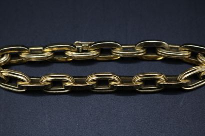 null Bracelet in yellow gold 750 thousandths mesh forçat, a link on two grooved....