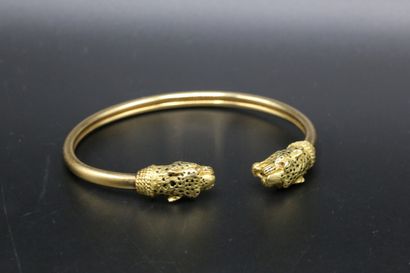 null Bracelet en or jaune 750 millièmes orné de deux têtes de léopard avec émail...