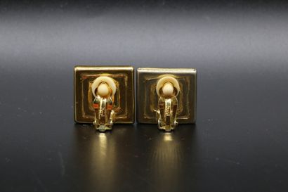null Yves Saint Laurent, pair of golden metal clips with a black square pattern