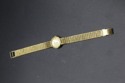 null Montre bracelet de femme en or jaune 750 millièmes, boitier rond cadran marqué...