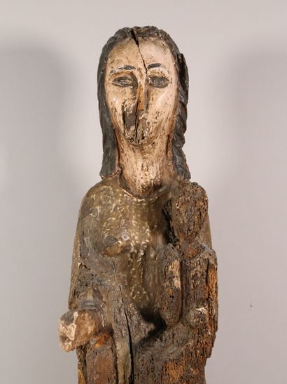 null Vierge à l'enfant 

sujet en bois sculpté polychrome

H. 51 cm 

sur un socle...