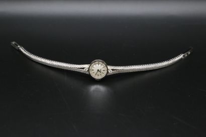 null LONGINES

Montre bracelet de dame en or gris 750 millièmes, le cadran à fond...