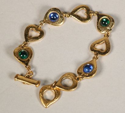 Yves Saint Laurent

bracelet métal doré et...