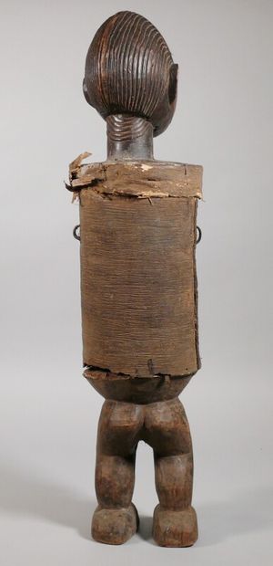 null Anthropomorphic ithyphallic container in wood with dark patina, the cylindrical...