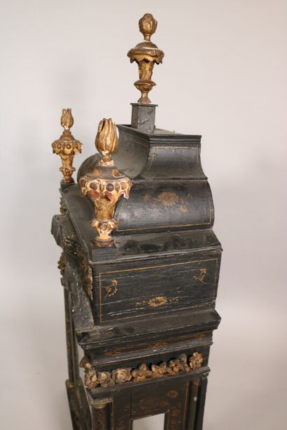 null Black lacquered wood floor regulator with rich painted decoration on the front...