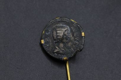 null Suite of three gold tie-pins decorated with three ancient coins: two Roman and...