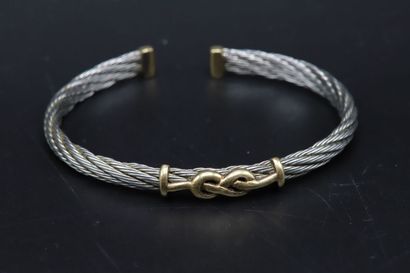 null In the style of Fred, steel and yellow gold bracelet - Gross weight: 21.4 g...