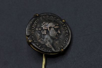 null Suite of three gold tie-pins decorated with three ancient coins: two Roman and...