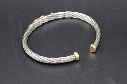null In the style of Fred, steel and yellow gold bracelet - Gross weight: 21.4 g...