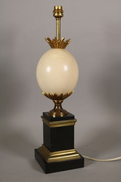 null In the taste of the HOUSE CHARLES

Lamp decorated with an ostrich egg, bronze...