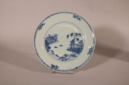null COMPAGNIE DES INDES AND CHINA 

A soup plate and a flat plate decorated with...