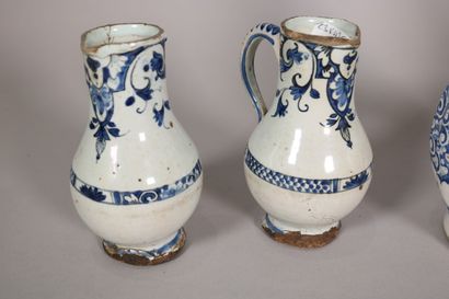 null ROUEN 

Pair of ovoid bottles of godronnée form decorated with blue camaïeu...