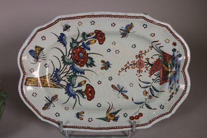 null ROUEN

A body of terrine, a lid and an oval dish with polychrome decoration...
