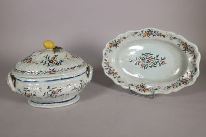 null ROUEN 

A bowl, a lid and an oval dish with polychrome decoration of large bouquet...