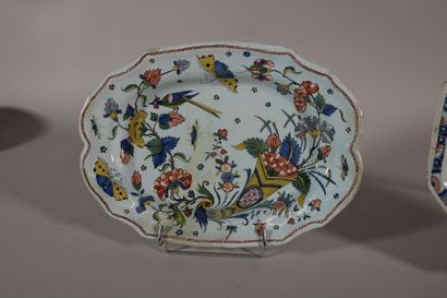 null ROUEN

A hollow octagonal dish decorated in blue and red monochrome in the center...