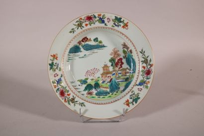 null CHINA 

Pair of soup plates with polychrome and gold decoration in green family...