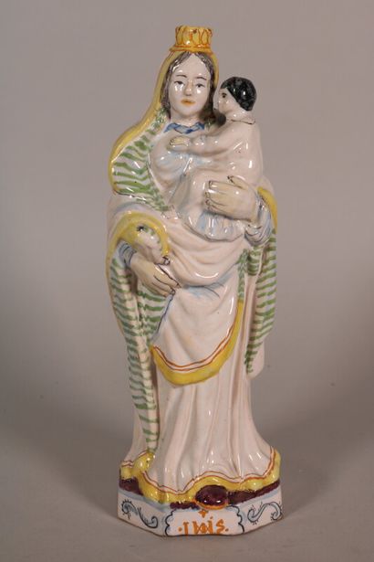 null NEVERS

Virgin and Child standing on an octagonal base with the monogram of...
