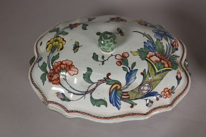 null ROUEN

A body of terrine, a lid and an oval dish with polychrome decoration...