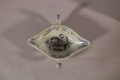 null NEVERS and MISCELLANEOUS

an oval sauceboat with two handles with polychrome...