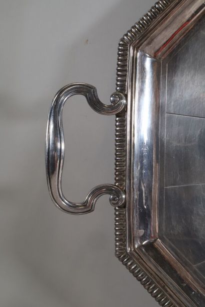 null CARDEILHAC, octagonal tray in silver plated metal, with two handles. The outline...