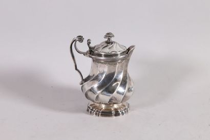 null Silver creamer resting on a heel, body with twisted ribs in recall on the lid....