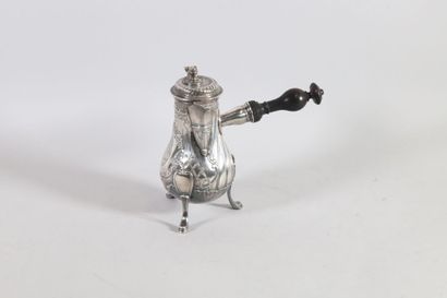 null Selfish silver jug of baluster shape, body with twisted ribs, engraved with...