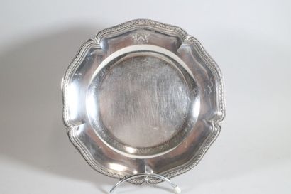 null Silver plate, contoured edge with frieze of ovals and interlacing. Wing engraved...