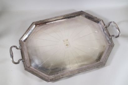 null CARDEILHAC, octagonal tray in silver plated metal, with two handles. The outline...
