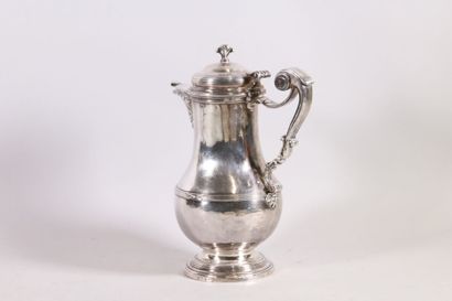null Ewer or water pot in silver, baluster shape, plain body decorated with a frieze...