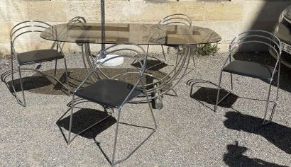 null Table and four chairs in chromed steel, U-shaped base, oval smoked glass to...