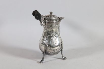 null Selfish silver jug of baluster shape, body with twisted ribs, engraved with...