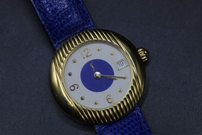 null YVES SAINT LAURENT, 

Ladies' wristwatch, round gilt metal case, hour markers,...