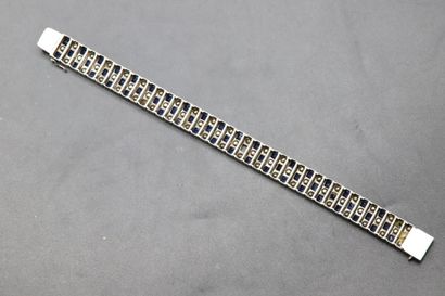 null Silver bracelet decorated with blue and white imitation stones. Gross weight:...