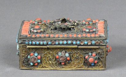 null Rectangular brass box with fine floral filigree decoration enhanced with coral,...