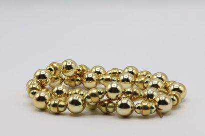 null Yves Saint Laurent, collier à perles boules dorées - usures