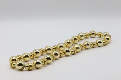 null Yves Saint Laurent, collier à perles boules dorées - usures