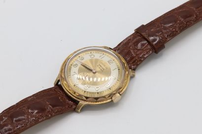null Boitier de montre acier doré de forme ronde, cadran à fond doré marqué Genève,...