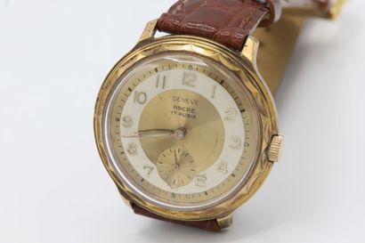 null Boitier de montre acier doré de forme ronde, cadran à fond doré marqué Genève,...
