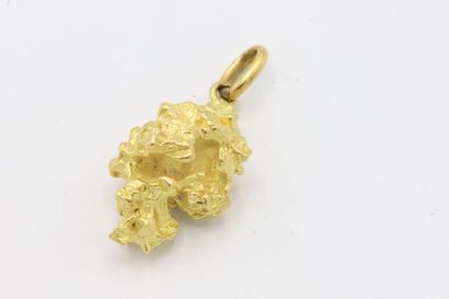 null Pendentif façon pépite en or jaune 750 millièmes
15,17 g 
L. 3.5 cm