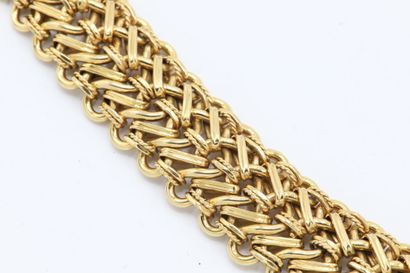 null Bracelet articulé en or jaune 750 millièmes maille stylisée d'entrelacs unis...