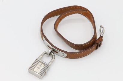 null HERMÈS 
Kelly
Montre bracelet boitier cadenas et bracelet double tour en cuir...