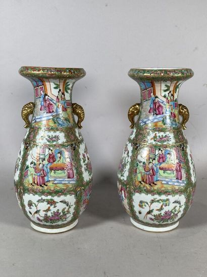 CANTON 
A pair of porcelain baluster vases...
