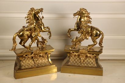 null Guillaume COUSTOU (1677-1746) after,
Horses of Marly,
Two gilt bronze subjects...