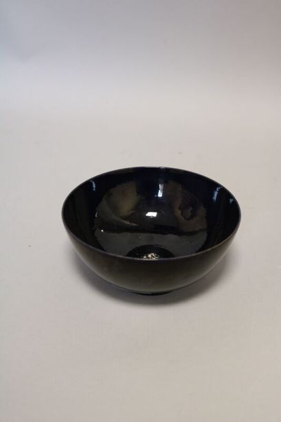Porcelain bowl with eggplant enamel. bears...