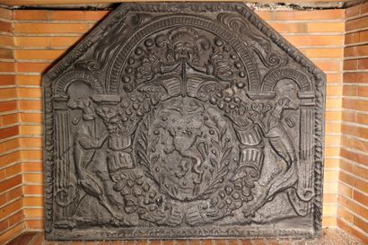 null Cast iron fireback decorated with a crown flanked by greyhounds, in the center...