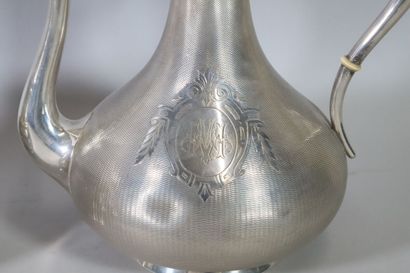 null Four-piece silver service, baluster-shaped body with monogrammed guilloche in...
