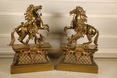 null Guillaume COUSTOU (1677-1746) after,
Horses of Marly,
Two gilt bronze subjects...