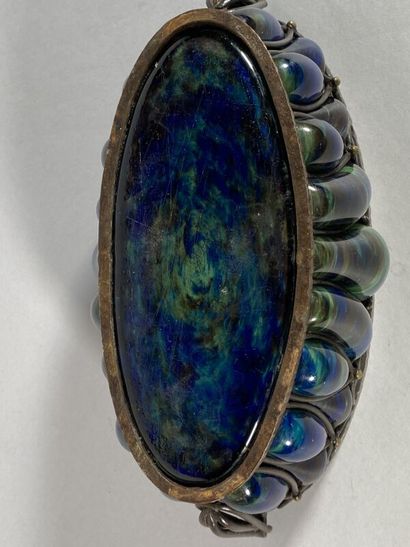 null André DELATTE (1887-1953) à Nancy 
Jardinière en verre marmoréen bleu et vert,...