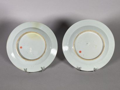 null CHINA 
Two porcelain plates decorated with polychrome enamels of the pink family...